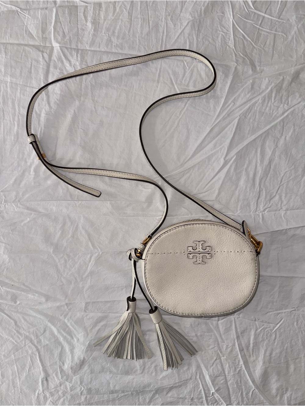Tory Burch Ivory Pebbled Leather Round Crossbody with Tassels